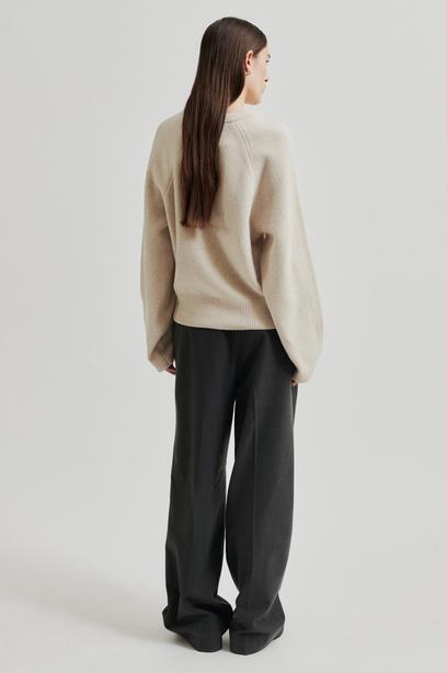 Joline neule, pumice stone