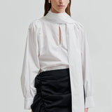 Calico pusero, White