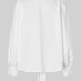 Calico pusero, White