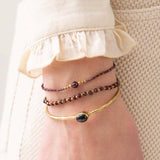 Iris rannekoru Garnet, Gold
