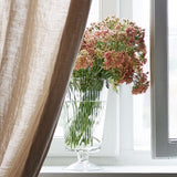 Jalallinen lasivaasi, facet