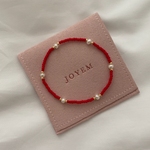 Aria rannekoru, kulta