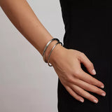 Tube bangle, Steel