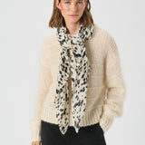 Felisia huivi, Black Dot