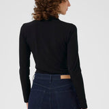 Efinas poolopaita, Black