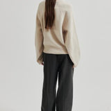 Joline neule, pumice stone
