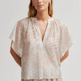 Shades pusero, Plaza Taupe