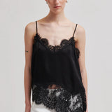Wilina pitsitoppi, Black