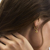 Elements korvakorut, Gold