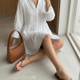 Martina mekko, White