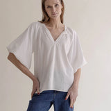 Ina pusero, White