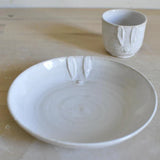 Pupumuki pieni, White
